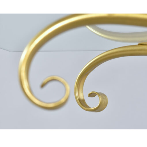 Gold metal scroll work