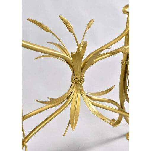 Bundle of gold tole wheat on sofa table