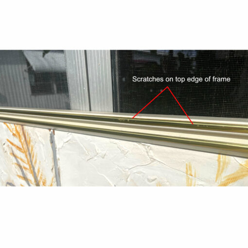 Scratches along top edge of picture frame