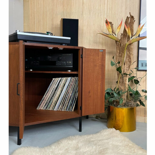 Fit components and records inside the corner record cabinet