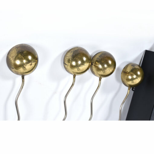 Brass eyelashes on Curtis Jere sculpture
