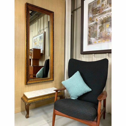 Gilded Hollywood Regency wall mirror with white marble console table