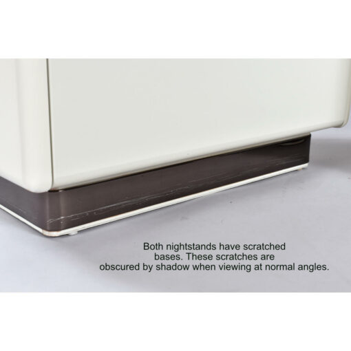 Scratched metallic bases on nightstands