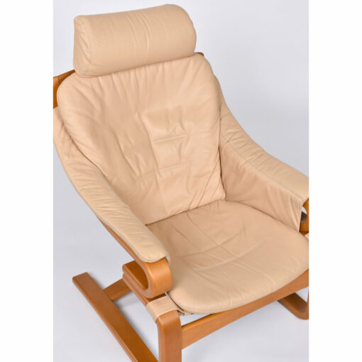 Danish leather sling chair with matching ottoman by Svend Skipper