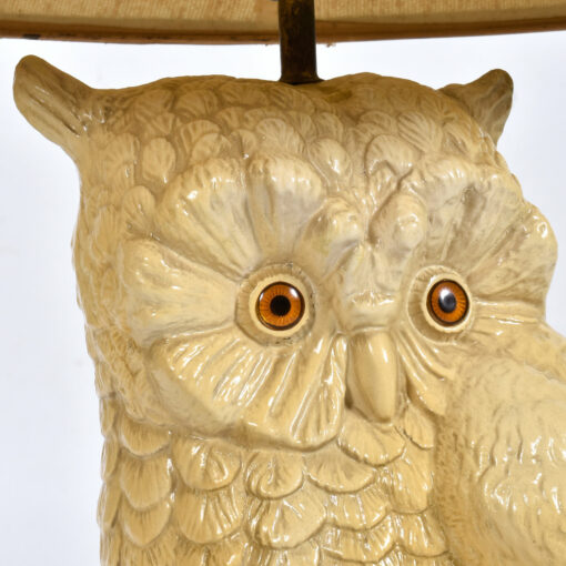 Jewel-like orange plastic eyes on owl lamp