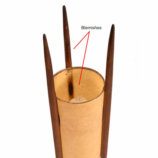 Spots in lamp shade where wood meets shade