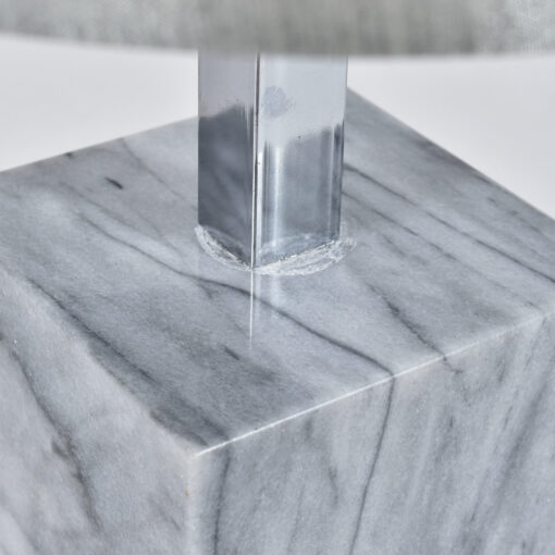 Scratches around neck of table lamp