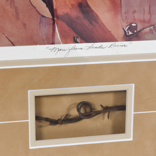 Barbwire embedded in framing