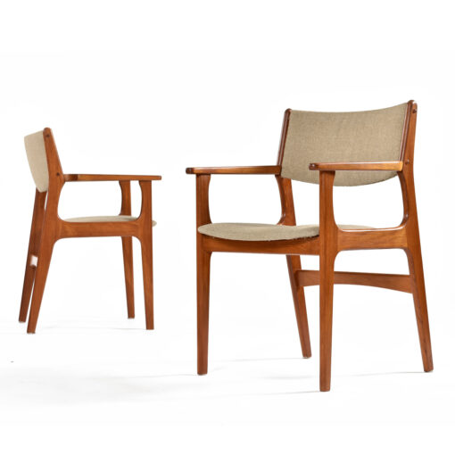 Pair Danish teak dining chairs with arms and beige upholstery