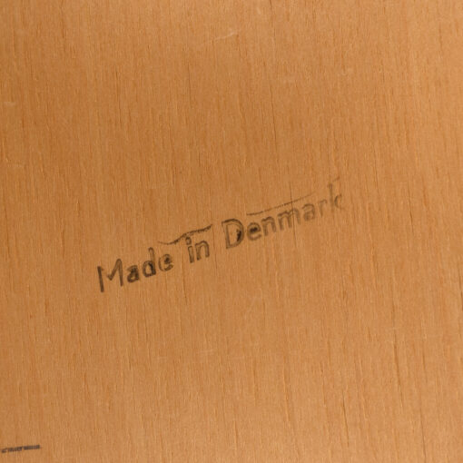 Made in Denmark stamp on dining chairs