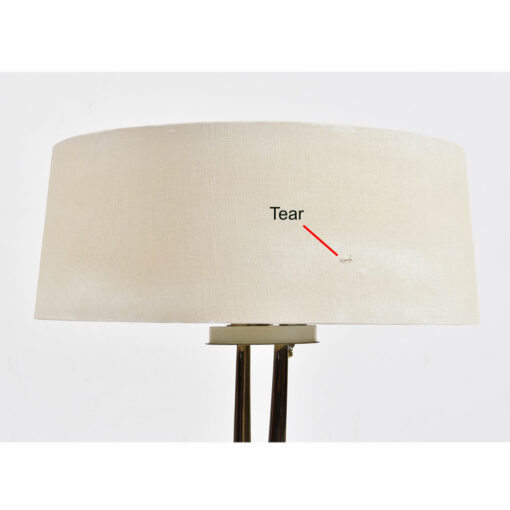 Lamp shade has a tear