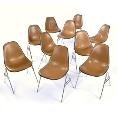 10 Eames stacking DSS fiberglass shell chairs with brown Naugahyde seat pads