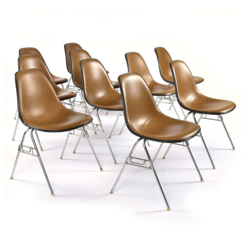 Group of 10 Eames stacking DSS fiberglass shell chairs with brown Naugahyde seat pads