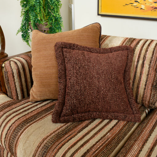 Throw pillows included with brown sofa