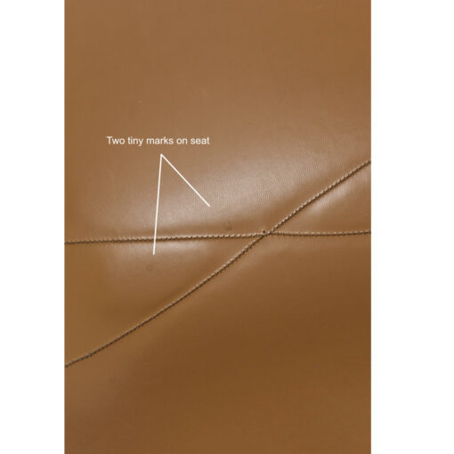 Tiny drip marks on Eames Naugahyde shell chair pad
