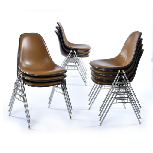 Stacking DSS Charles Eames shell chairs with Naugahyde seats