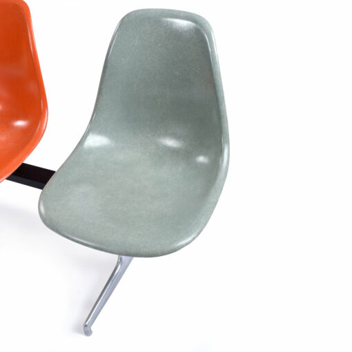 Light blue Eames fiberglass shell chair