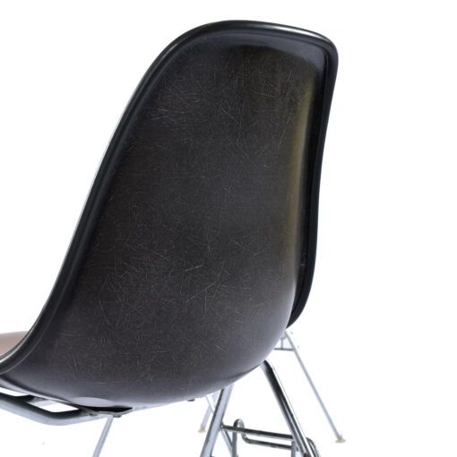Black fiberglass shell chair by Charles Eames for Herman Miller