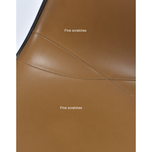 Fine scratches on the seat of the DSS Eames Naugahyde seat pad