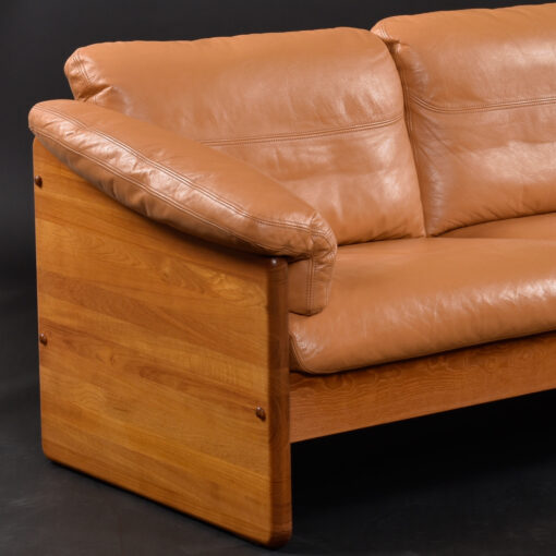 Leather solid teak danish sofa