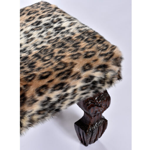 Faux leopard fur on Witco conquistador chair seat