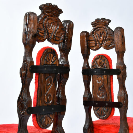 Back view of high back Witco red fur tiki chairs with iron cladding