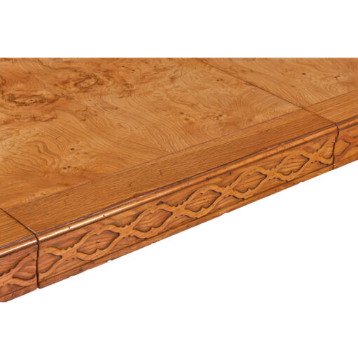 Henredon burl dining table with carved pattern along the edge