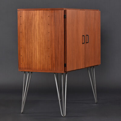 Lots of storage space in Mid-Century Modern cabinet. Can be dry bar, TV stand, stereo cabinet, or record cabinet