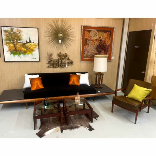 Mid-Century Modern homestead painting situated above sofa