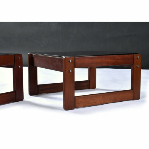 Profile view of rosewood end table by Percival Lafer