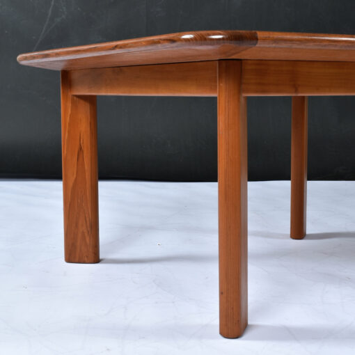Wedge shaped legs on Danish Modern solid teak coffee table