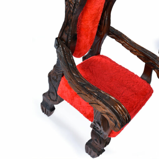 Elaborately carved arms on Witco conquistador armchairs